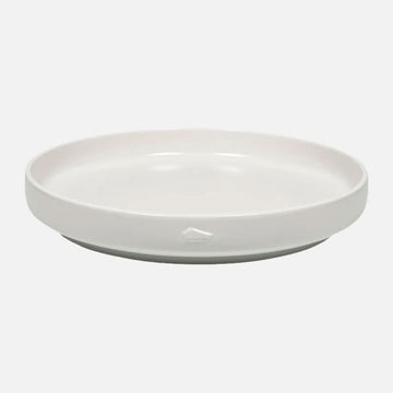 White ceramic plate on a light gray background.