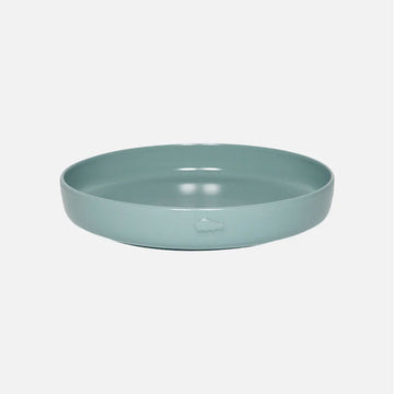 Light blue ceramic bowl on a white background.