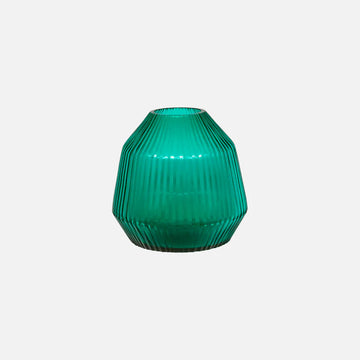 Green textured vase on a light gray background.