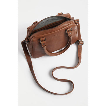 A tan leather bag with top handles and a long cross body strap.