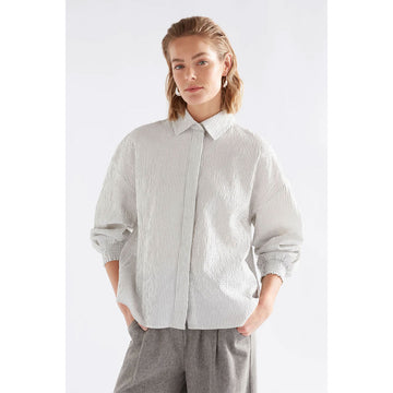 Front view of a women's shirt in white with black pin stripes.