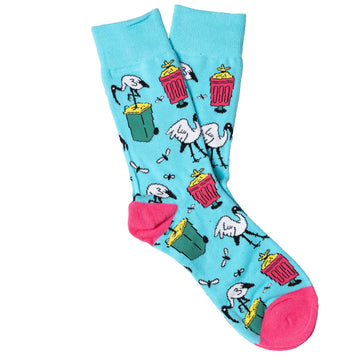 A pair of light blue socks with a pink heel and toe and illustrated with ibis birds and rubbish bins.