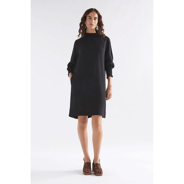 Front view of a black dress with a cuffed neckline and sleeves.