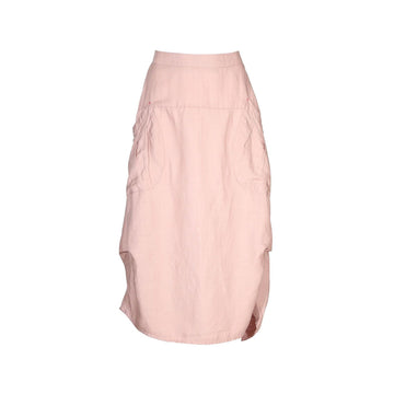 A pale pink skirt with side pockets against a white background.