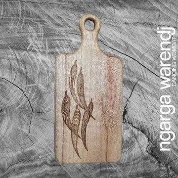 A wooden board with a paddle and etched with five gum leaves.