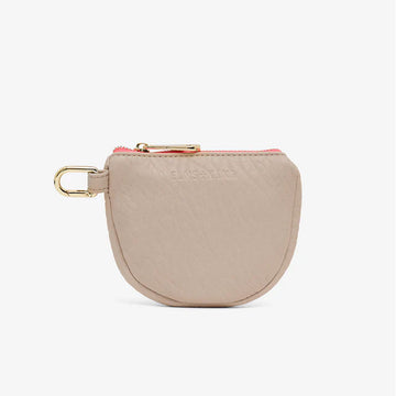 Front view of a U shaped coin purse in oyster pebble.