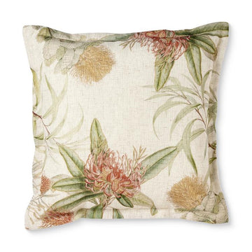 Decorative pillow with floral pattern on a white background.