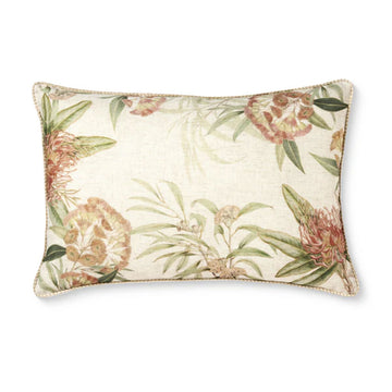 Decorative pillow with floral pattern on a white background.