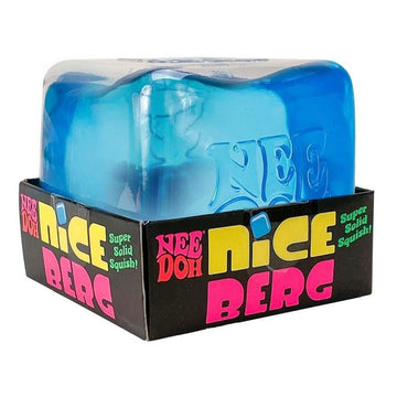 A squish stress ball shaped like an ice cube in an open box with the text 'Nee Doh Nice Berg' along the bottom.
