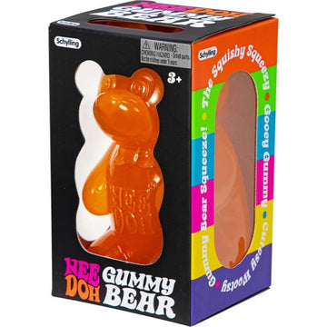 A gummy bear shaped stress toy in a box with the heading 'Nee Doh Gummy Bear' on the front.