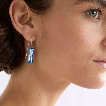 Blue rectangular jewel hook earrings on a white background.