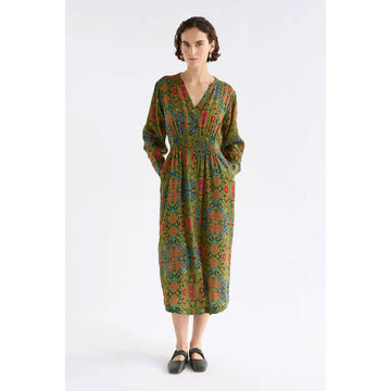 Long-sleeve dress with a green and orange pattern on a white background.