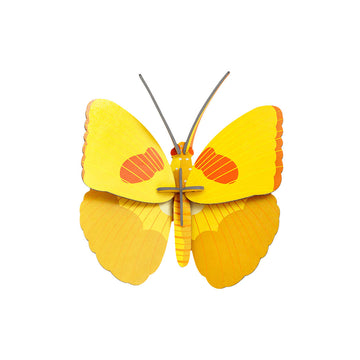 A yellow butterfly 3D model made from cardboard.