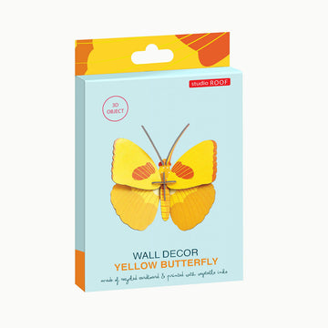 A yellow butterfly 3D model made from cardboard.