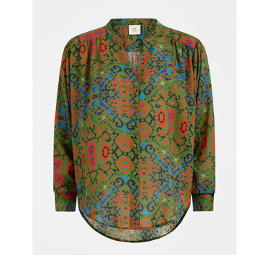 A women's long sleeve shirt with a green, orange and blue pattern.