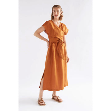 Bronze coloured wrap dress on a white background.