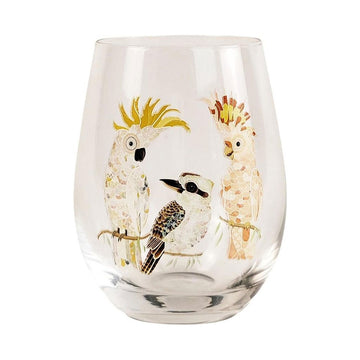A glass tumbler illustrated with a cockatoo, kookaburra and Major Mitchell cockatoo.