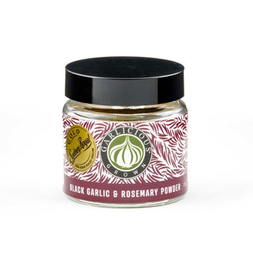 A clear jar with a wide product label and the title 'Black Garlic and Rosemary Powder'.