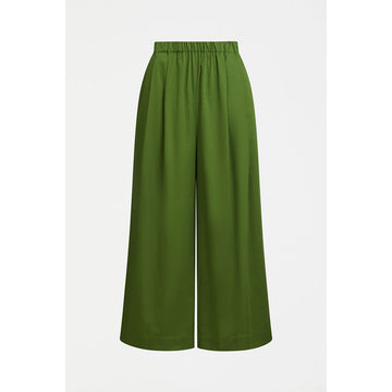A pair of green wide leg pants with an elasticised waist.