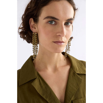 Pair of blue beaded earrings on a light grey background.