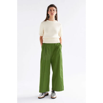 A pair of green wide leg pants with an elasticised waist.