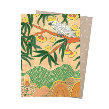 A greeting card illustrated with a cockatoo in a tree.