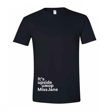 Front view of a black tshirt with the text 'It's upside down Miss Jane' written in the bottom corner.