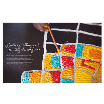 'Songlines Tracking the Seven Sisters' front cover featuring a round image with an earthy painting over a dark blue background.