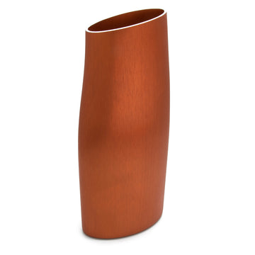 A copper vase with a silver edge in a tall shape with a slight taper in.