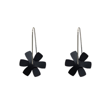 A pair of drop earrings made from two overlapping propeller shapes with flat edges.