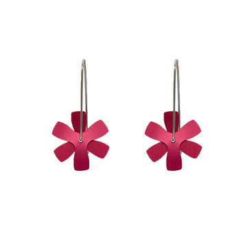A pair of drop earrings made from two overlapping propeller shapes with flat edges.