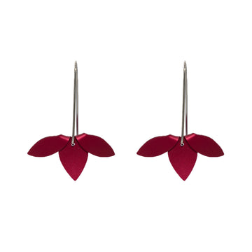 A pair of dangle earrings with three red points in a flip over design.