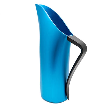 A bright blue water jug with a black curved handle is standing on an angle.