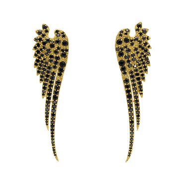 A pair of wing shaped earrings in gold covered with black diamonties.