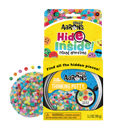 A round silver container with the title 'Crazy Aaron's Mixed Emotions Thinking Putty' with illustrations of coloured faces.
