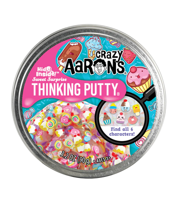 A round silver container with the title 'Crazy Aaron's Sweet Surprise Scales Thinking Putty' with illustrations of lollies.