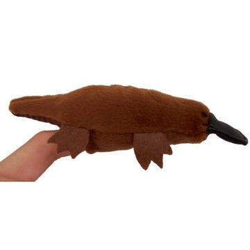 A plush platypus finger puppet on a finger against a white background.