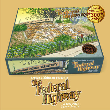 The Federal Highway puzzle box pictured with an illustrated image of the Australian Capital Territory sign on a sand brick wall.