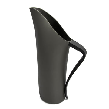 A charcoal water jug with a long open spout and curved black handle.