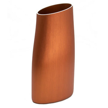 A tall vase in copper with a silver edge at the top and curved edges.
