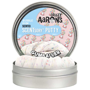 A silver round container with the text 'Crazy Aaron's Scented Scentsory Putty Gumballer' with images of gumball machines. There is a second container in front showing the white putty inside.