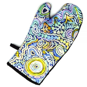 An oven mitt with artwork by Cedric Varcoe printed on it in blue, purple and yellow.