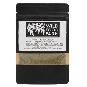 Black packet of pepperleaf with a clear window showing the product inside.