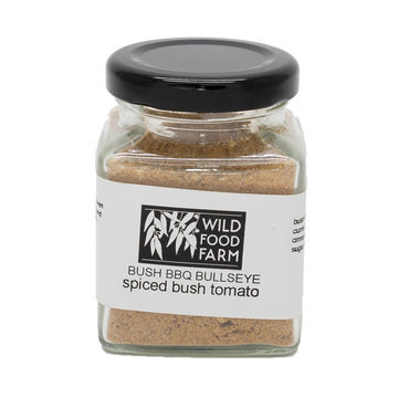 Clear glass jar with a black lid and a white product label. The product can be seen through the jar.