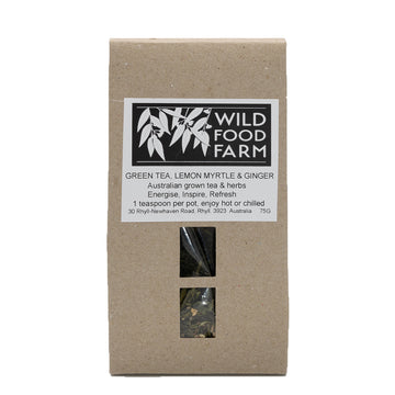 Brown packet with a product label and two clear windows showing the tea inside.