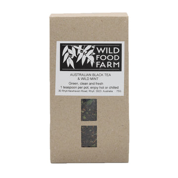 Brown packet of tea shown with a product label and two small clear windows showing the tea inside.