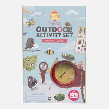 Outdoor Activity set box cover showing illustrations of bugs and leaves with a cut out showing a magnifying glass inside.