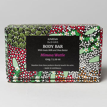 Soap box pictured featuring artwork by Coral Hayes Panaka in red and green.