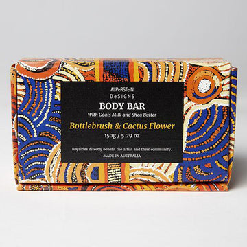 A soap box pictured with artwork by Nora Nyutjangka Davidson in blue and yellows.