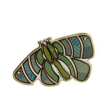 Enamel on metal blue, green and white Australian bogong moth brooch by Ngarga-warendj. 